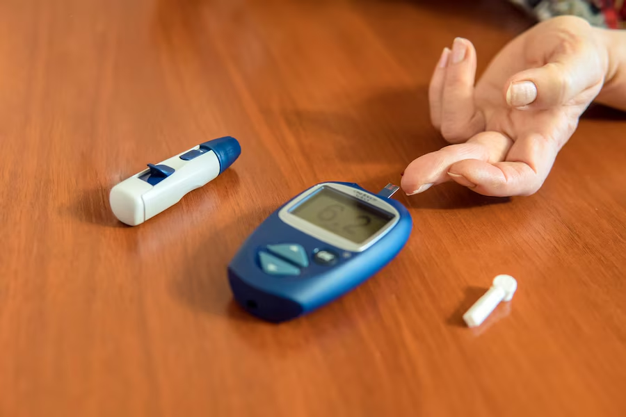 asian-doctor-using-digital-glucose-meter-check-sample-blood-sugar-level-treatment-diabetes_